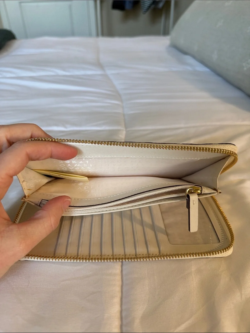 kate spade cream floral cutout zip-around wallet